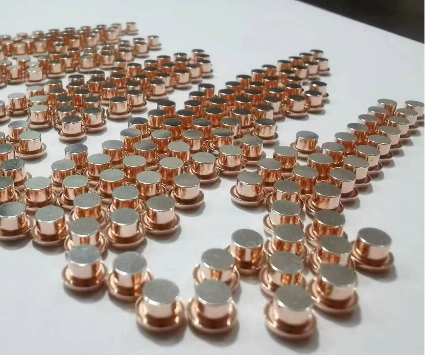 Assorted copper nickel alloy products including pies, tubes, and fittings